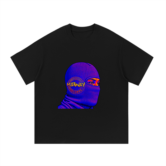 Black t-shirt with a graphic of a person wearing a blue balaclava with visible branding.